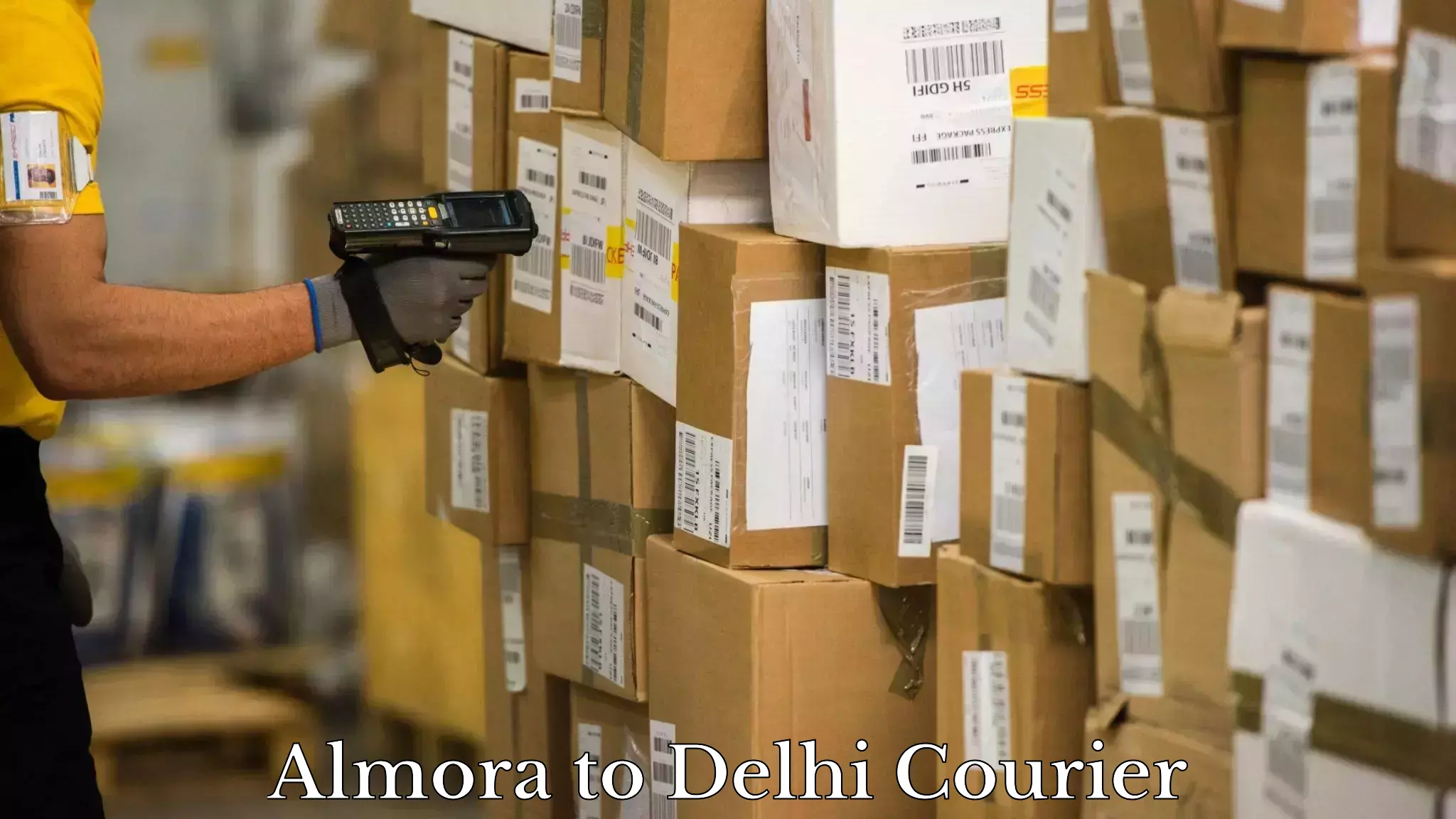 Full-service courier options Almora to East Delhi