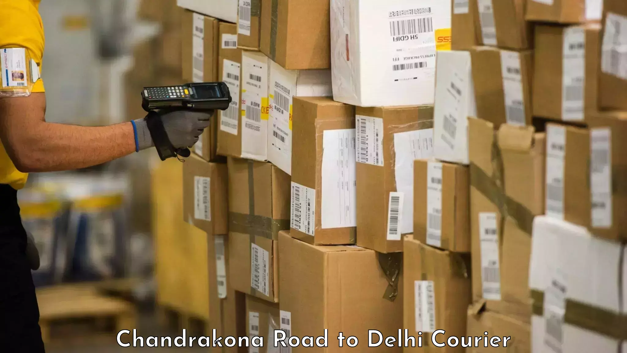 Door-to-door baggage service Chandrakona Road to Delhi