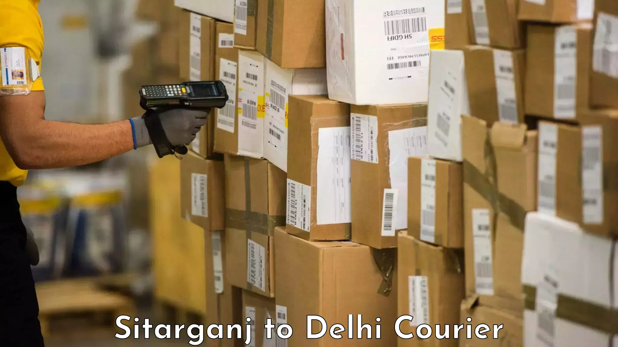 Baggage shipping optimization Sitarganj to Naraina Industrial Estate