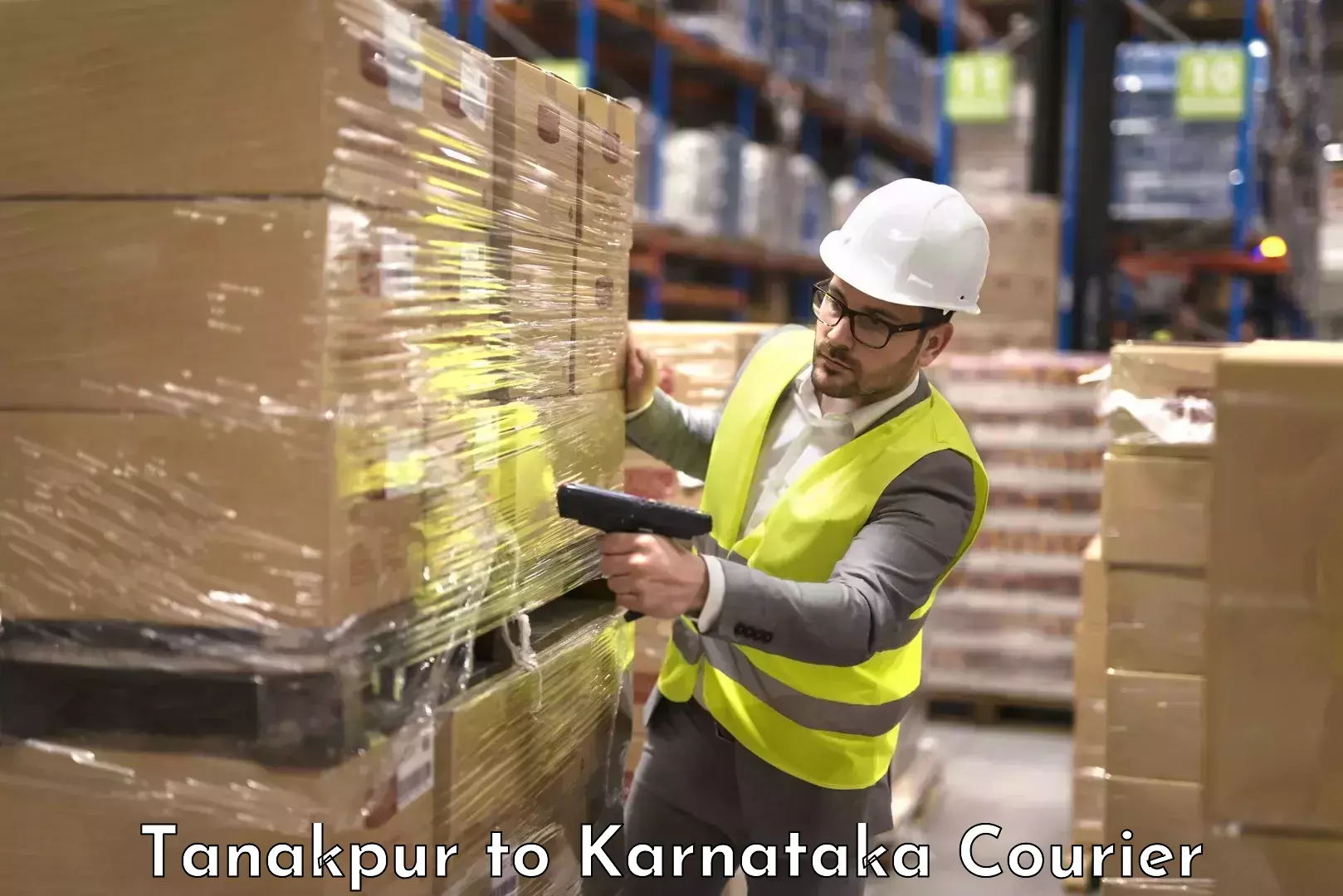 Heavy luggage shipping Tanakpur to Karnataka