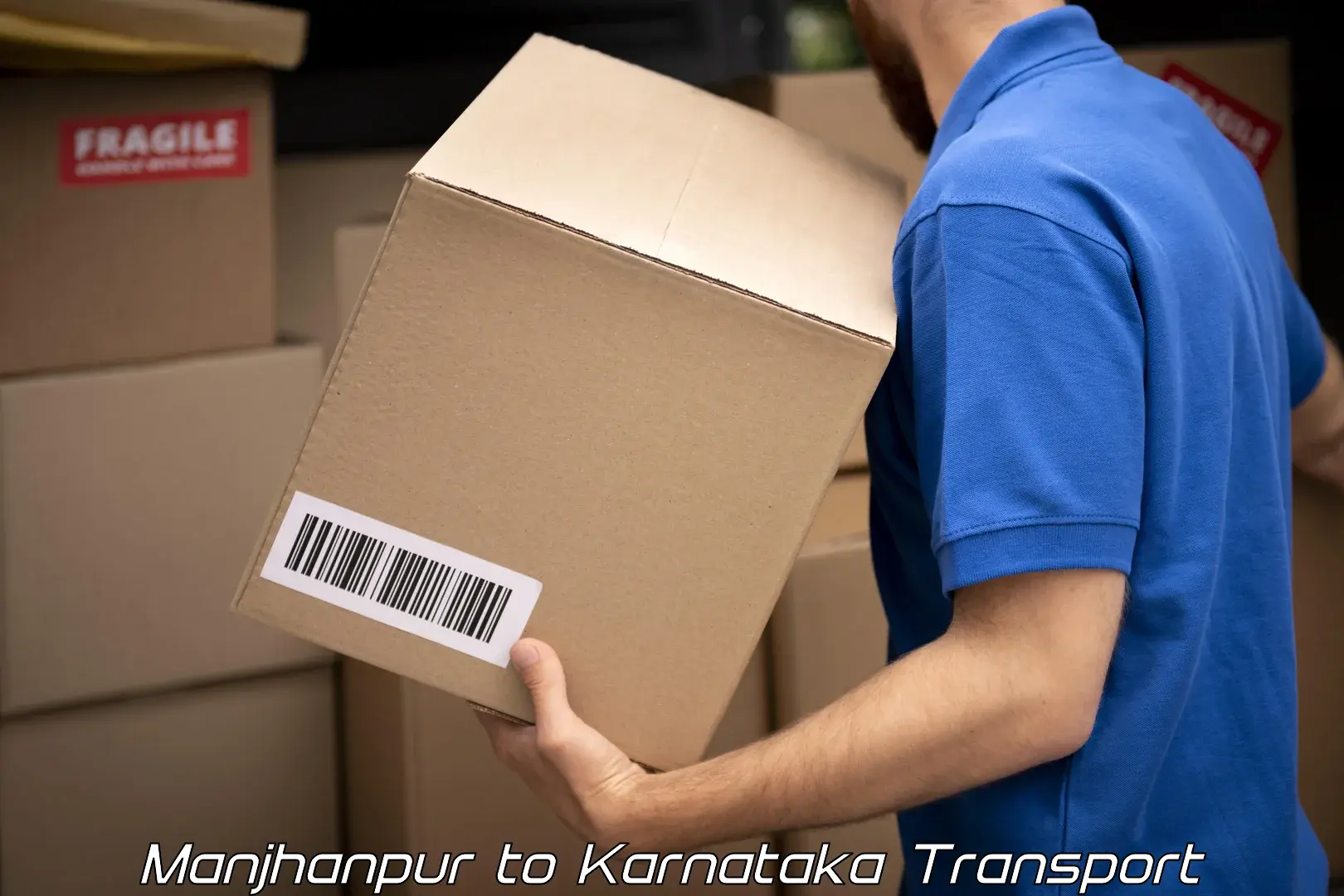 Transport in sharing Manjhanpur to Mangalore